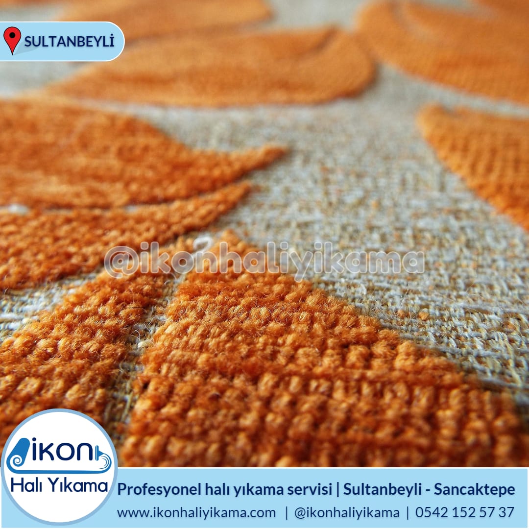 Turuncu ve gri desenli halının doku detayı